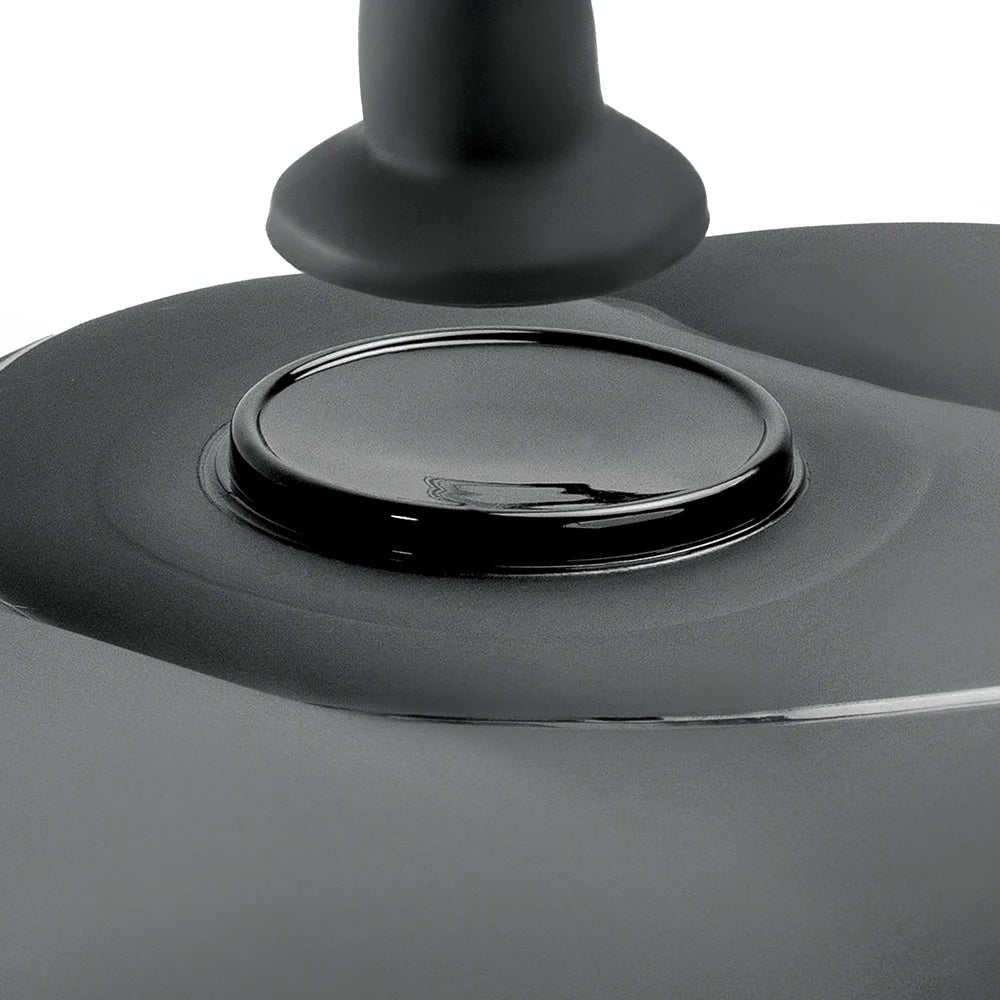 Close-up of a black 'love' chair with a gray base on a white background