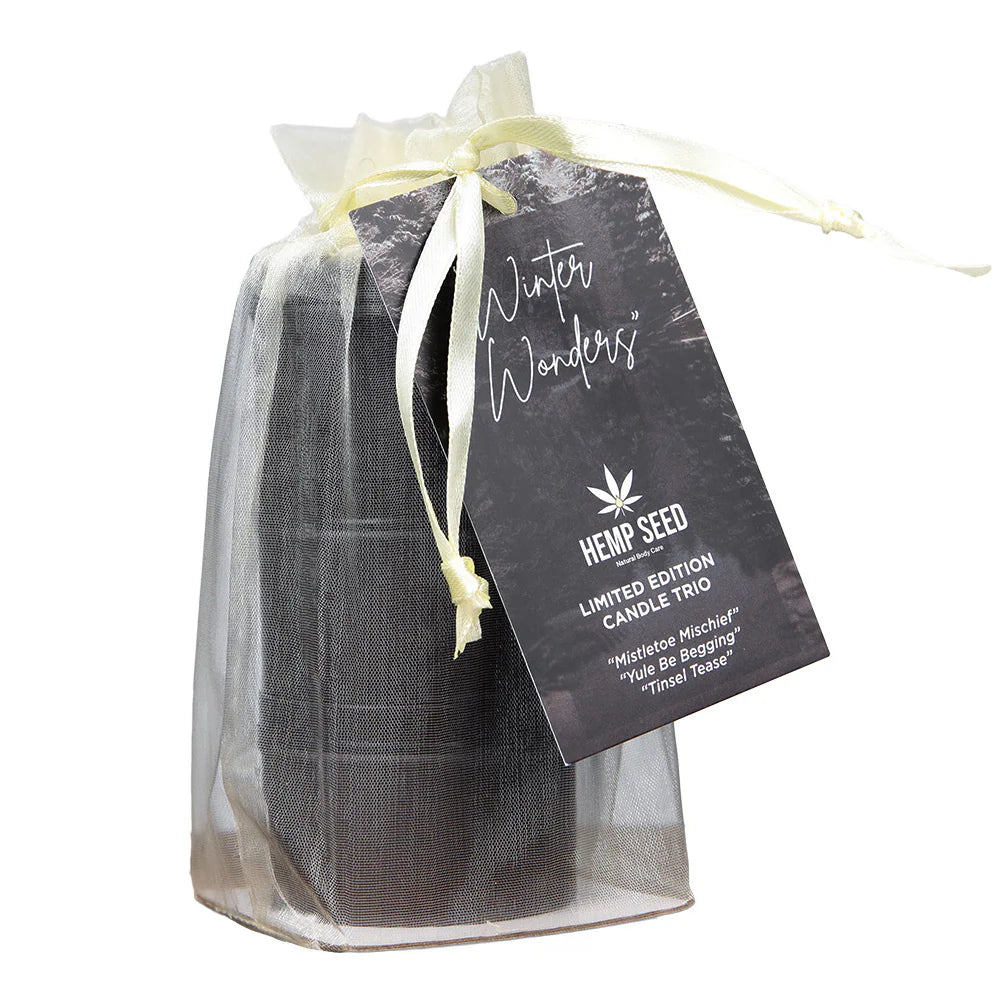 Hemp seed candle trio in a clear bag with a label on a white background